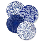 Selene porcelain dinner plates set of 4 styled with pizza and bread on woven placemat mix and match Japanese inspired table setting