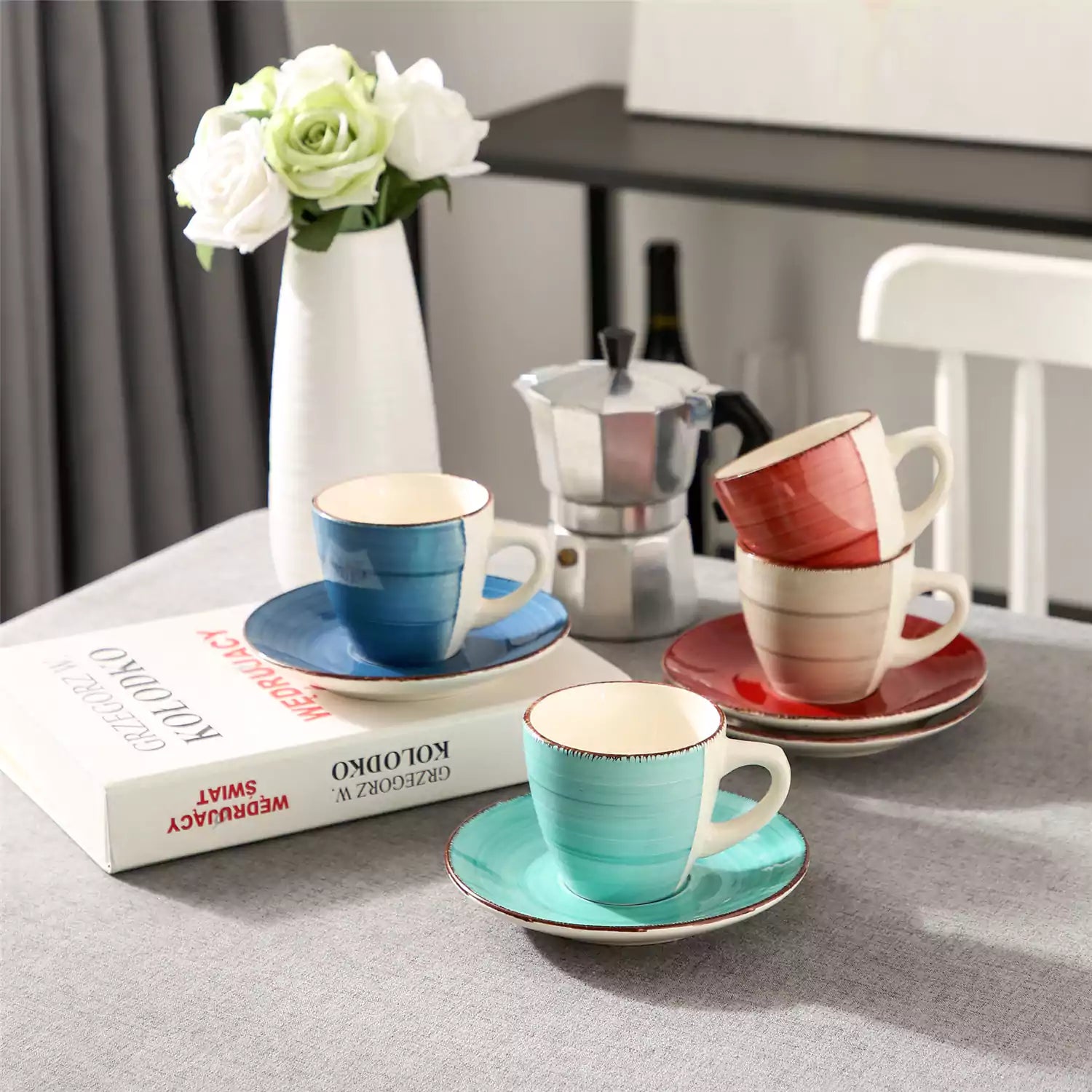 Steaming coffee served in colorful spiral stoneware cups and saucers-handmade vintage design - B