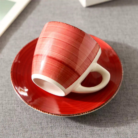 Steaming coffee served in colorful spiral stoneware cups and saucers-handmade vintage design - B