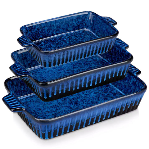 Starry 3 piece stoneware bakeware set with reactive glaze in navy blue on a wooden table