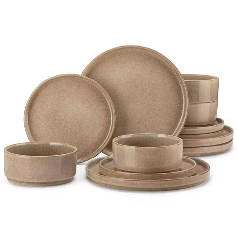 Anya 12 piece straight edge stoneware dinner set in caramel with food on a rustic farmhouse wooden table with a side salad and cutlery