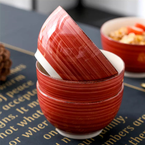 Bella Cereal Bowl Set of 4 in Red with spiral and speckled design - filled with fruit oatmeal - Red