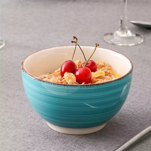 Bella Cereal Bowl Set of 4 in Turquoise with spiral and speckled design - filled with fruit oatmeal - Turquoise