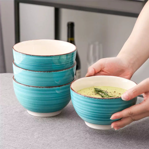 Bella Cereal Bowl Set of 4 in Turquoise with spiral and speckled design - filled with fruit oatmeal - Turquoise