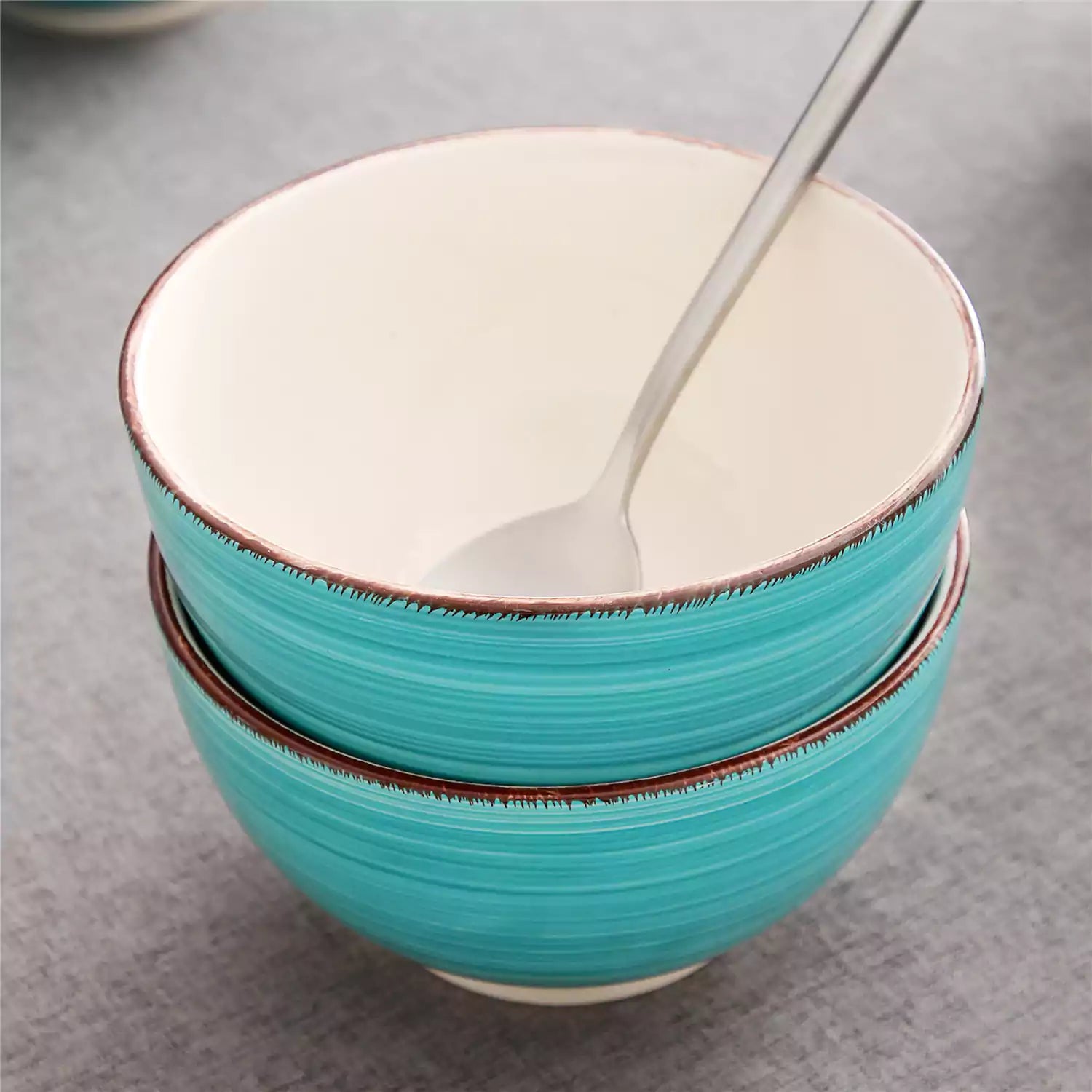 Bella Cereal Bowl Set of 4 in Turquoise with spiral and speckled design - filled with fruit oatmeal - Turquoise