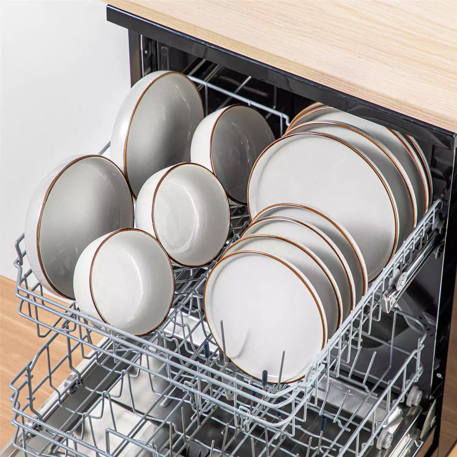 Loire 16-Piece Stoneware Dinnerware Set With A Refined Speckled Glaze And Earthy Brown Trim Ideal For Everyday Meals or Casual Gatherings - Grey