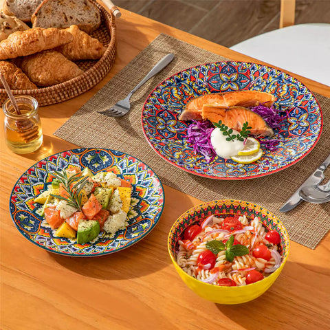 Bohemian Lumi porcelain dinnerware set for 6 with vibrant patterned plates diamond-embossed bowls served with fresh food bread and olive oil on wooden table