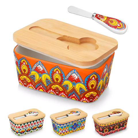 Lumi bold orange porcelain butter dish with lid in vibrant Bohemian pattern on a wooden table