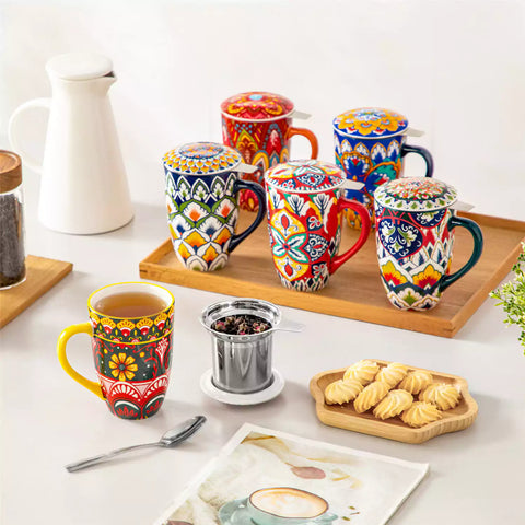Lumi lemon yellow porcelain tea mug with infuser and lid featuring vibrant Bohemian pattern on a wooden desk with laptop and plant