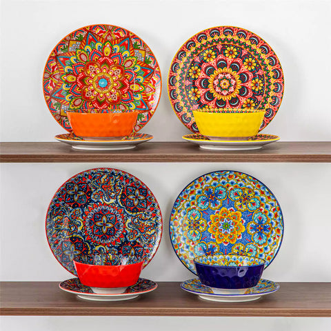 Bohemian Lumi 12 piece porcelain dinnerware set with vibrant patterned plates diamond embossed bowls served with steak eggs and fresh fruit on a wooden table
