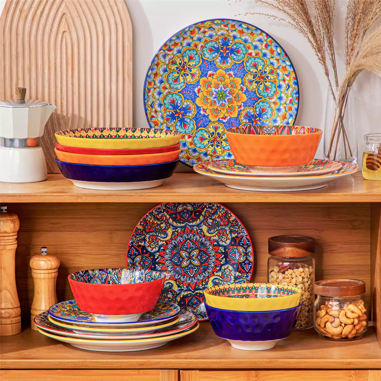 Bohemian Lumi 16 piece porcelain dinnerware set with colorful patterned plates and diamond-embossed bowls on a wooden table with assorted food and cutlery