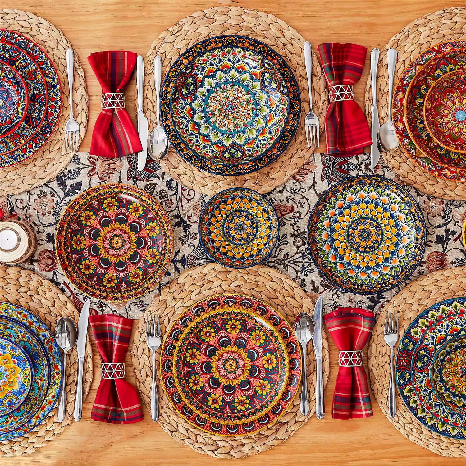 Bohemian style dining table set with Lumi 24 piece colorful dinnerware bowls and vibrant table décor ready for a lively meal