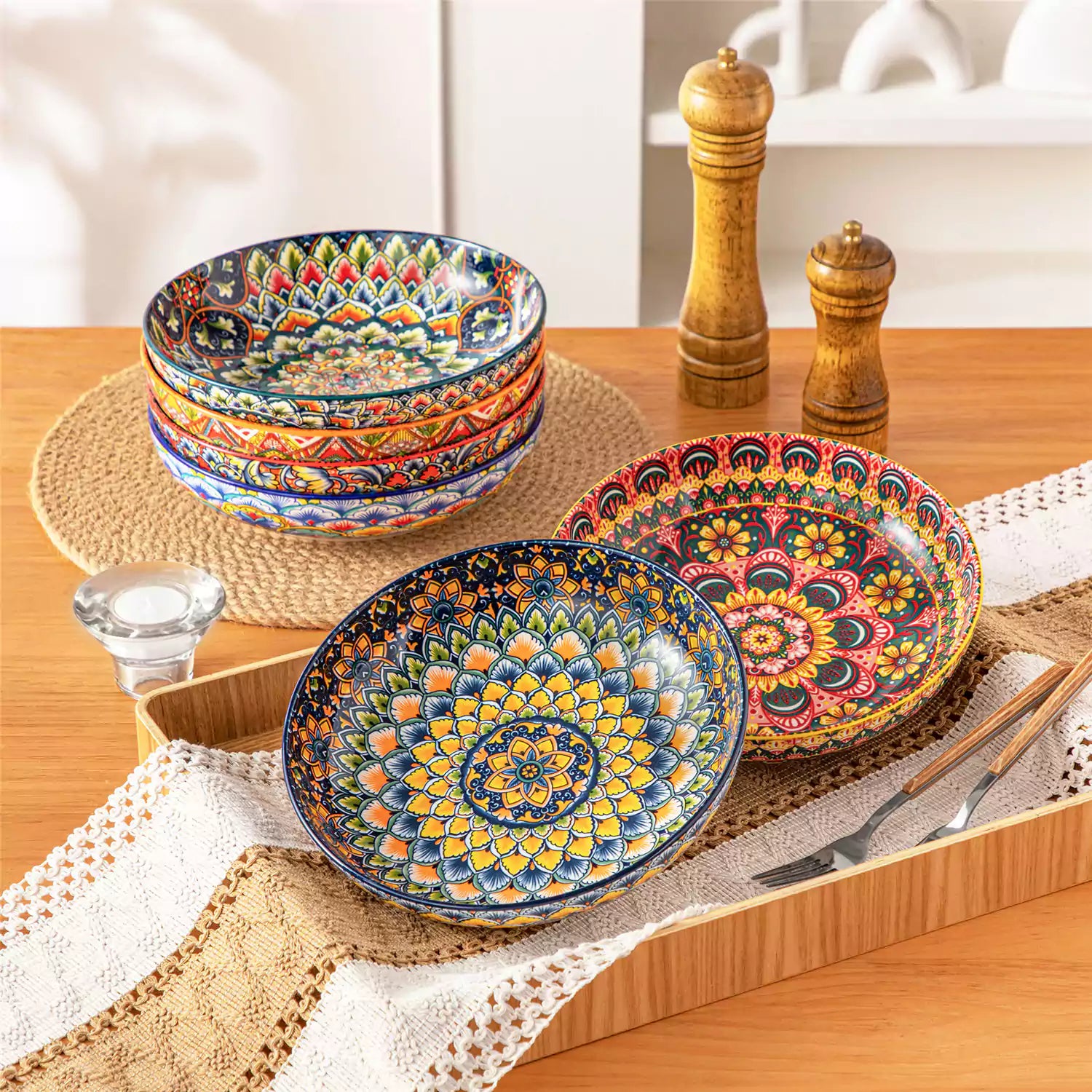 Vibrant Lumi porcelain pasta bowls filled with fruit salad pumpkin soup and pasta on a wooden dining table