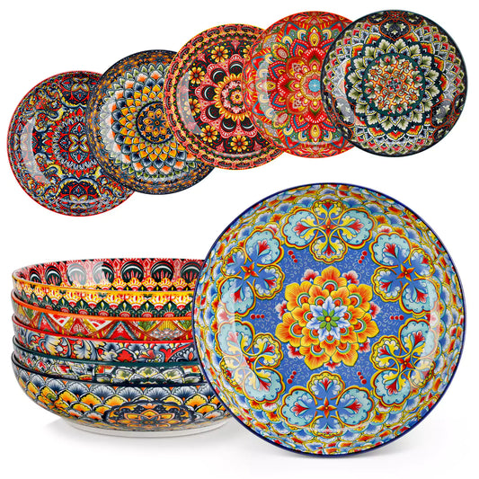 Vibrant Lumi porcelain pasta bowls filled with fruit salad pumpkin soup and pasta on a wooden dining table 1500