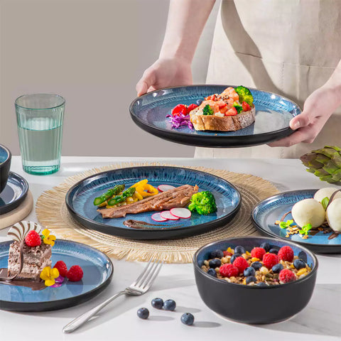 Playa 18-Piece Stoneware Dinnerware Set with plates and bowls for 6 - featuring a unique blue reactive glaze and a farmhouse-inspired style-vancasso