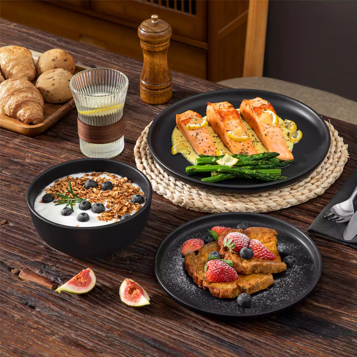 Playa 18-Piece Stoneware Dinnerware Set for 6, featuring plates and bowls in a modern Ibiza-inspired style with a matte black finish-vancasso