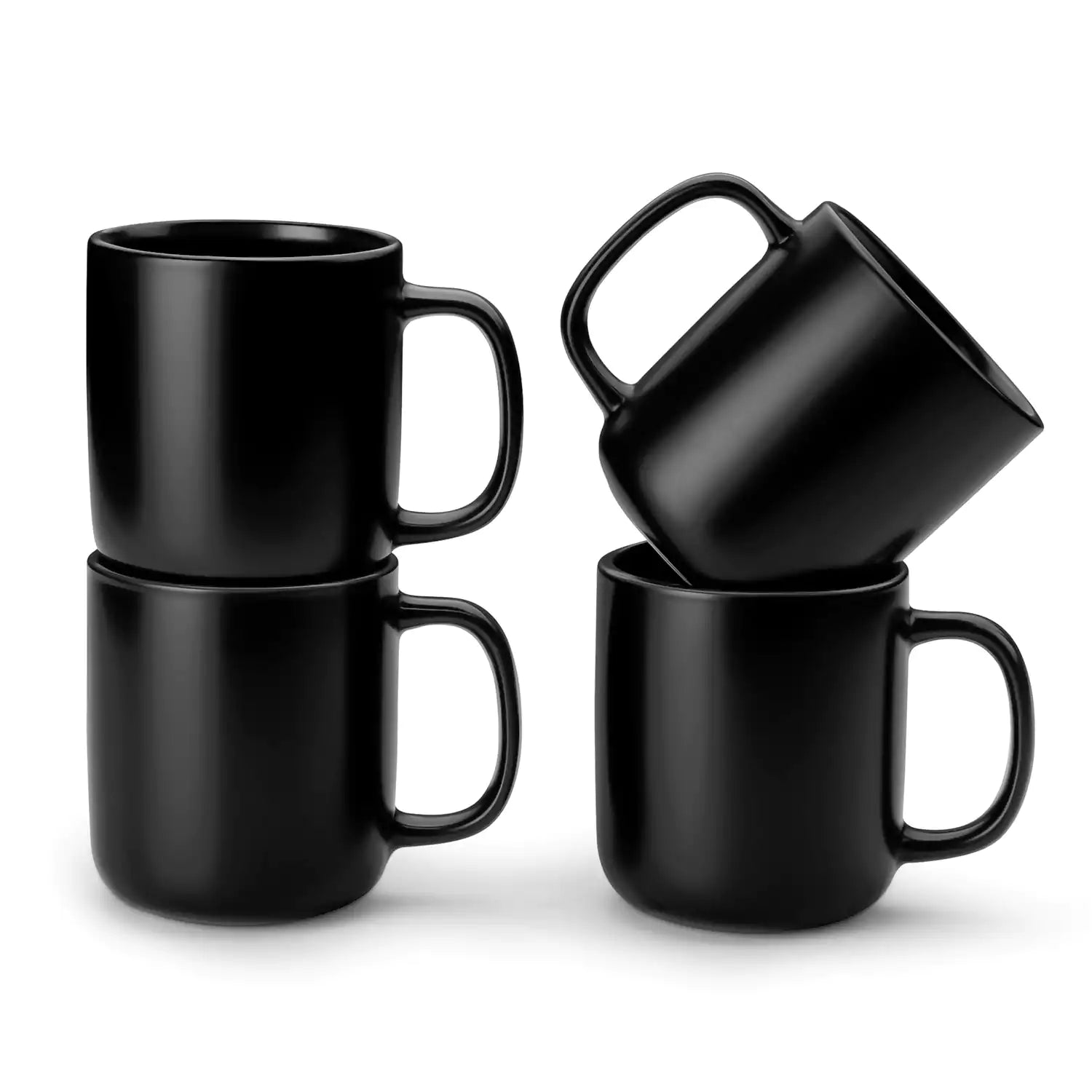 Playa 12oz stoneware mug in solid matte black on a rustic wooden surface for a moody coffee break with spoon and scattered beans