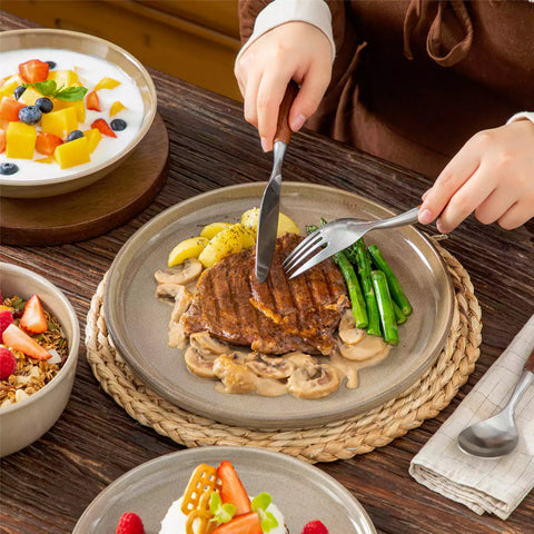 A glossy brown 16-piece stoneware dinnerware set from the Playa collection - featuring farmhouse charm with plates and bowls for 4 people-vancasso