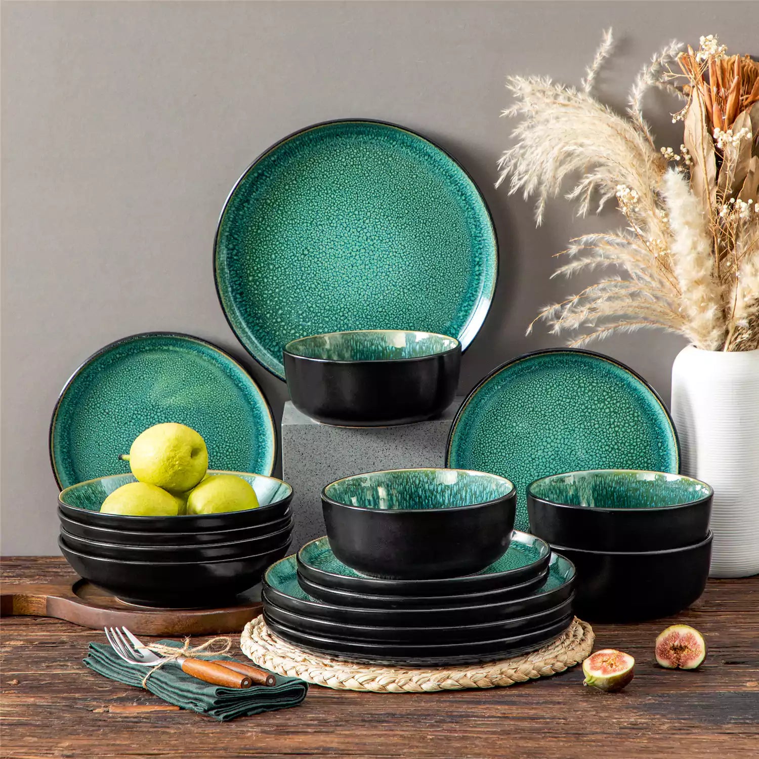 A glossy green 16-piece stoneware dinnerware set from the Playa collection - featuring farmhouse charm with plates and bowls for 4 people-vancasso