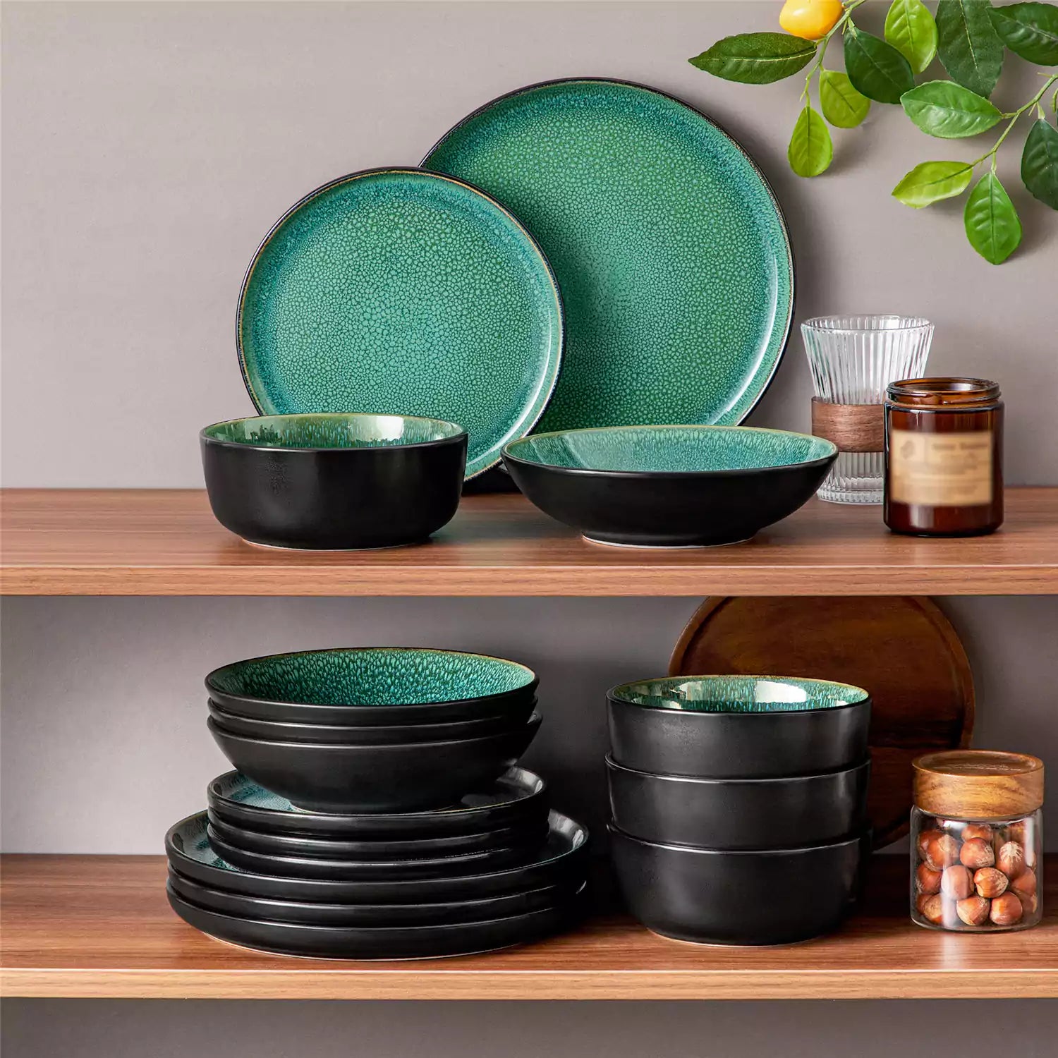 A glossy green 16-piece stoneware dinnerware set from the Playa collection - featuring farmhouse charm with plates and bowls for 4 people-vancasso