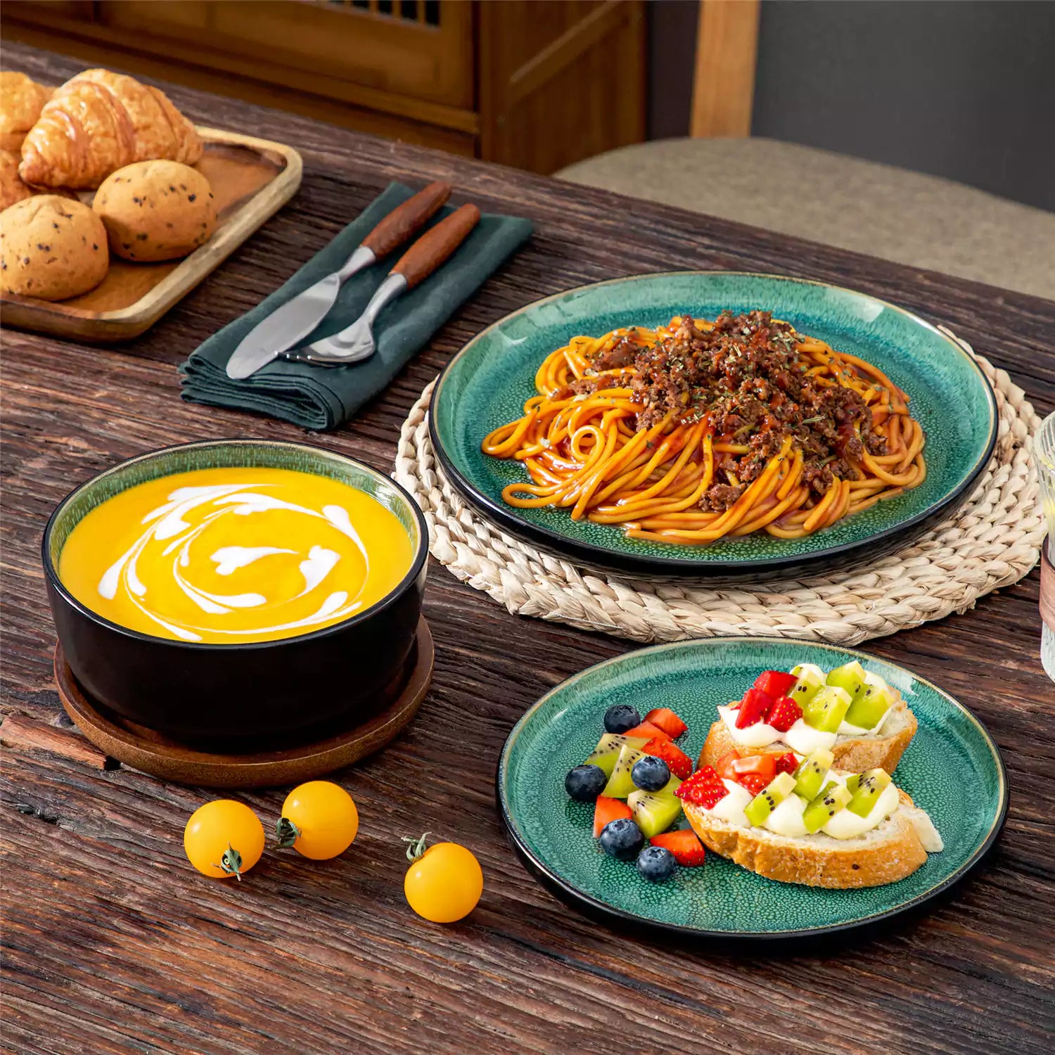 Playa 18-Piece Stoneware Dinnerware Set with plates and bowls for 6 - featuring a unique green reactive glaze and a farmhouse-inspired style-vancasso