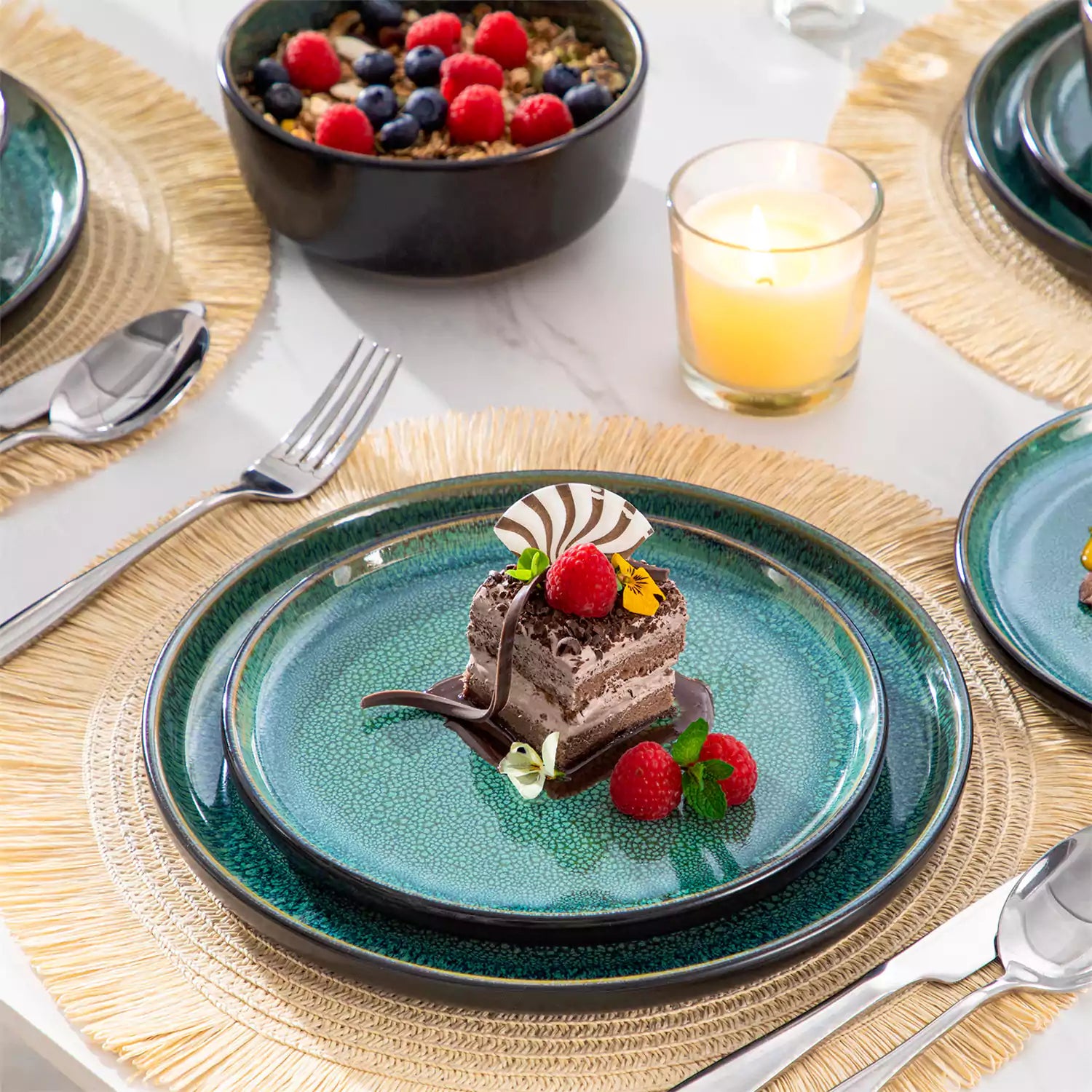 A glossy green 24-piece stoneware dinnerware set from the Playa collection - featuring farmhouse charm with plates and bowls for 6 people-vancasso