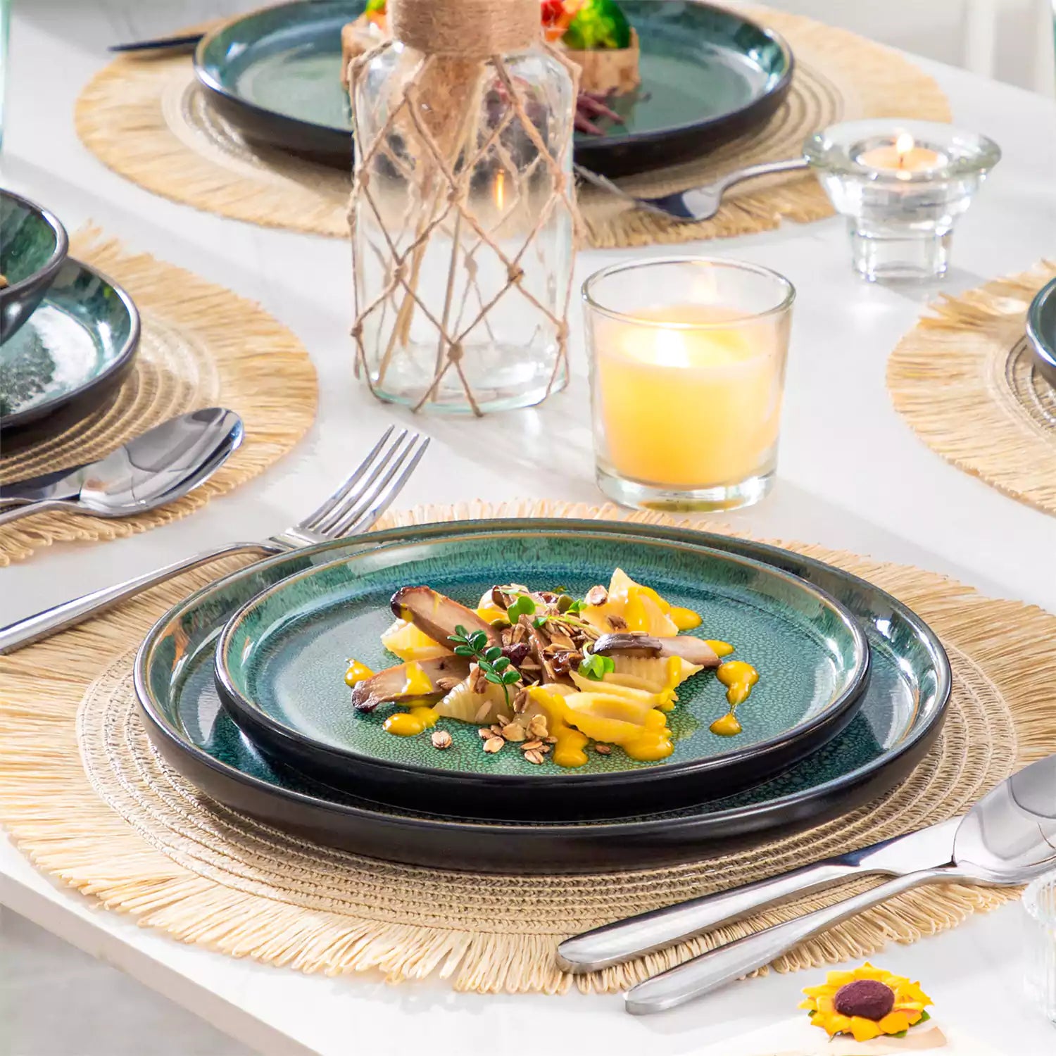 A glossy green 24-piece stoneware dinnerware set from the Playa collection - featuring farmhouse charm with plates and bowls for 6 people-vancasso