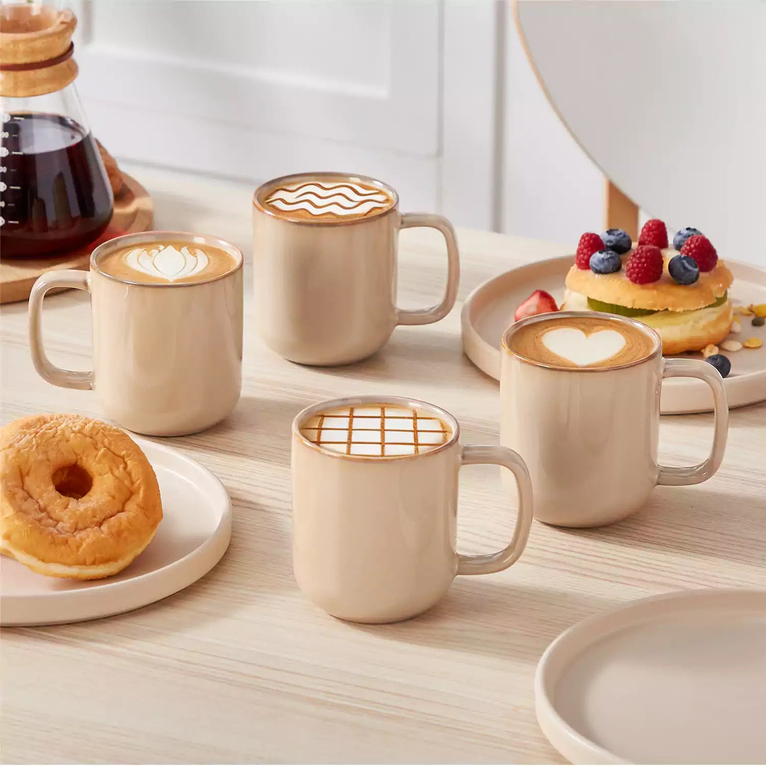 Playa 12oz stoneware mugs in glossy brown reactive glaze on a rustic wooden table for a cozy breakfast with fresh coffee pastries and berries