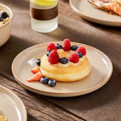 Playa 18-Piece Stoneware Dinnerware Set with plates and bowls for 6 - featuring a unique caramel reactive glaze and a farmhouse-inspired style-vancasso