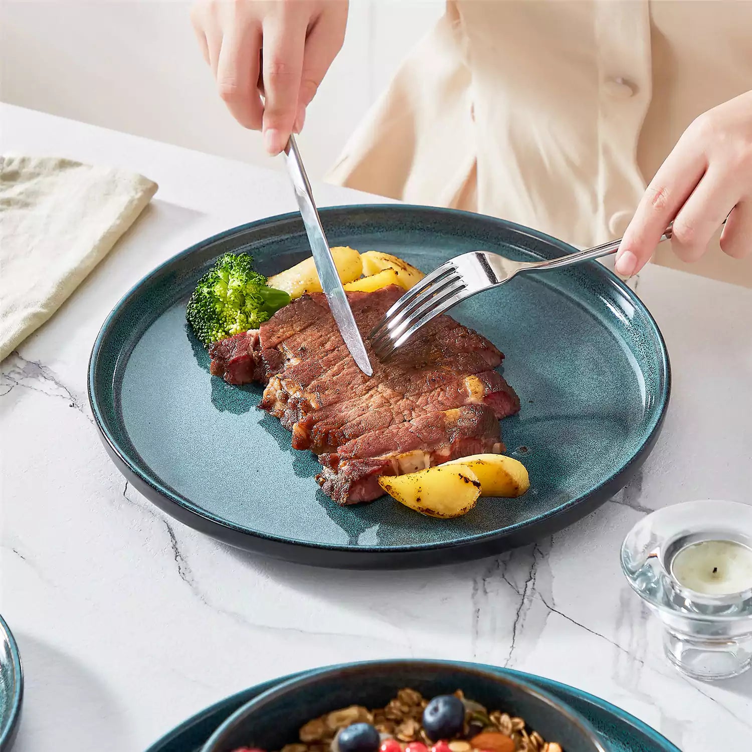 Playa 18-Piece Stoneware Dinnerware Set with plates and bowls for 6 - featuring a unique teal reactive glaze and a farmhouse-inspired style-vancasso