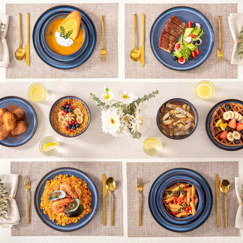 Sata blue stoneware 12 piece dinnerware set with dinner plates salad plates and cereal bowls styled with gold cutlery on textured surface farmhouse reactive glaze lipped edge service for 4