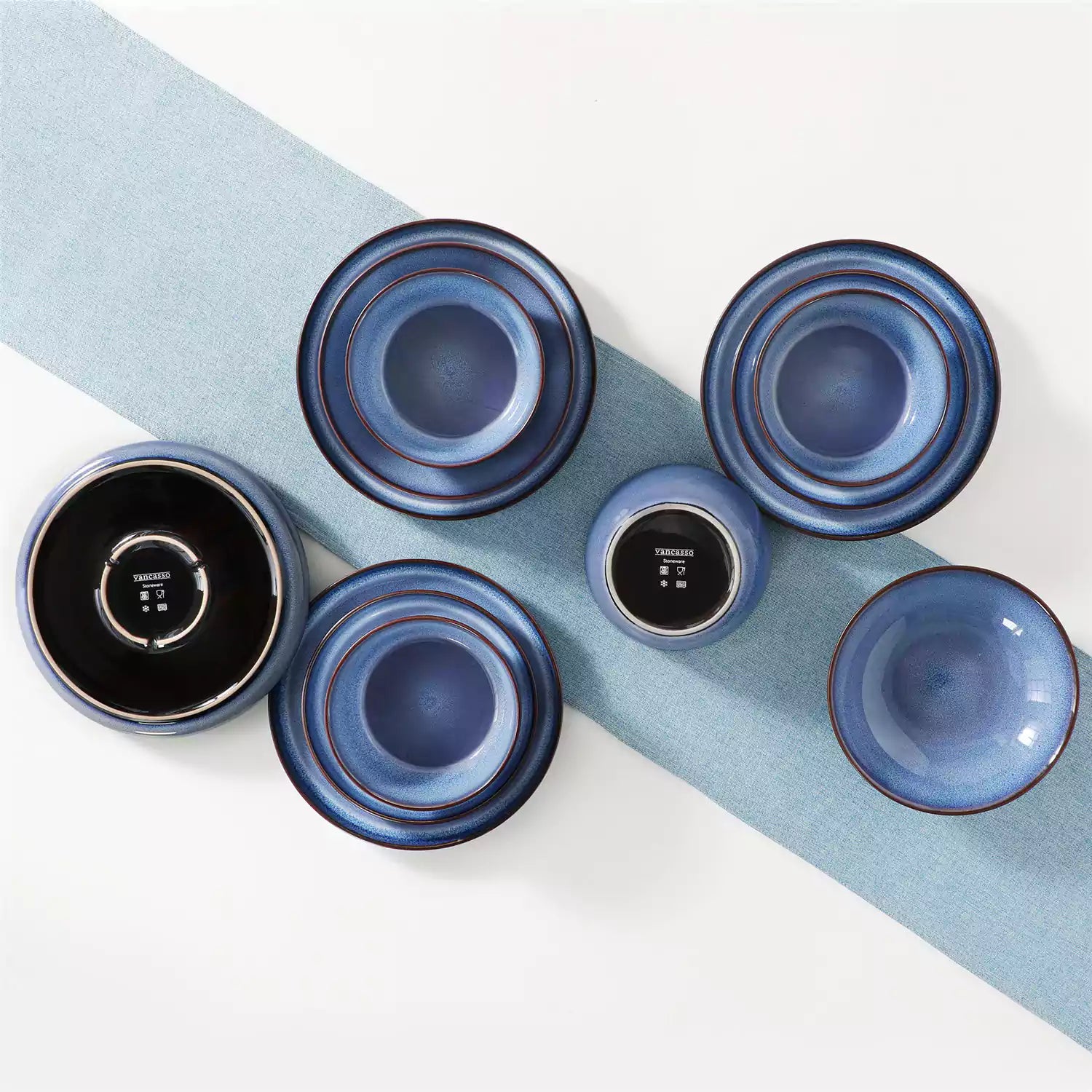 Sata blue stoneware dinnerware set 16 piece service for 4 assorted dishes with food on lipped edge reactive glaze plates farmhouse style white table setting