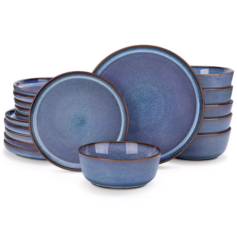 Sata blue stoneware 18 piece dinnerware set with dinner plates salad plates and cereal bowls styled on a wooden table with diverse meal setup farmhouse reactive glaze lipped edge service for 6