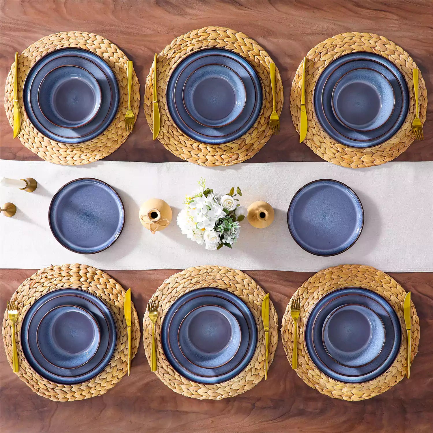 Sata blue stoneware dinnerware set styled dining table with dinner plates salad plates pasta bowls cereal bowls silverware and floral centerpiece farmhouse reactive glaze service for 6