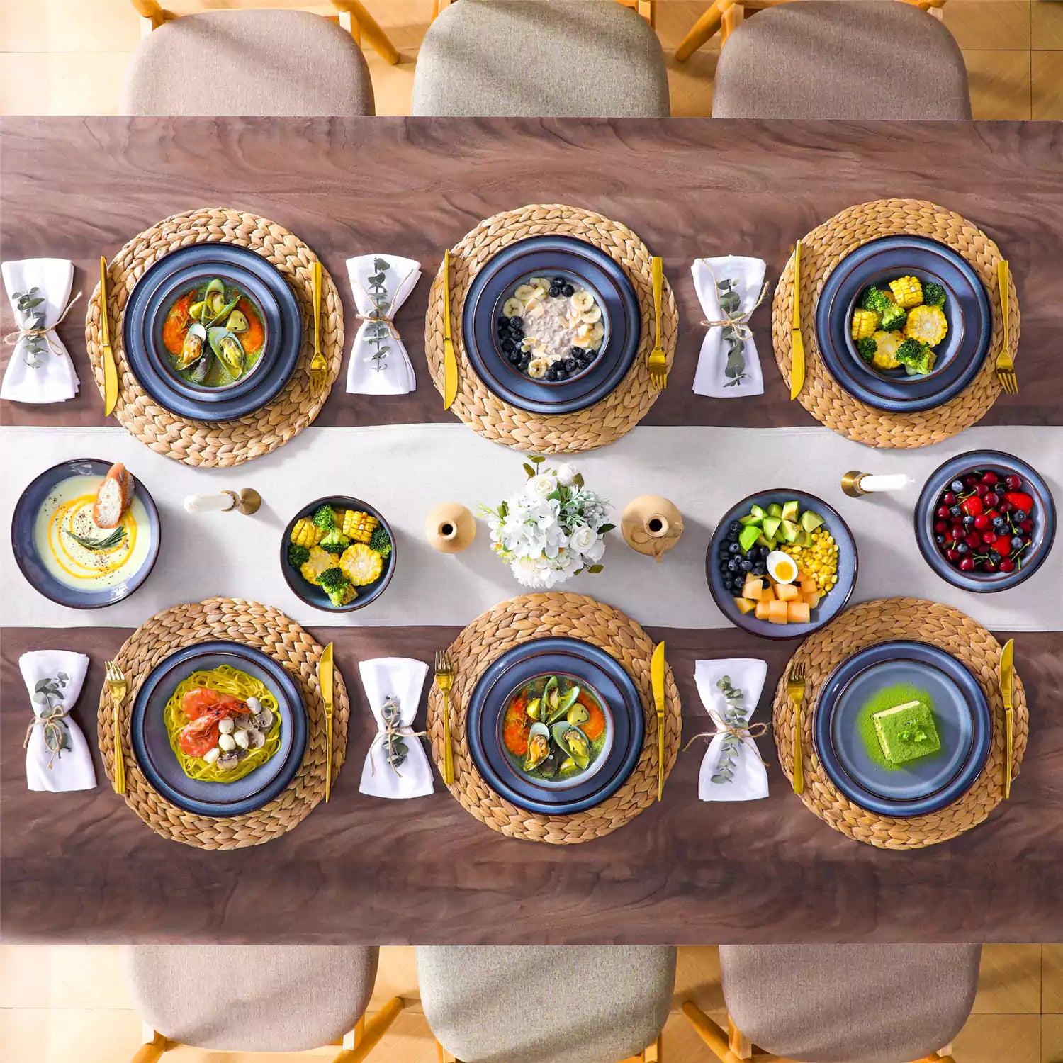 Sata blue stoneware dinnerware set styled dining table with dinner plates salad plates pasta bowls cereal bowls silverware and floral centerpiece farmhouse reactive glaze service for 6