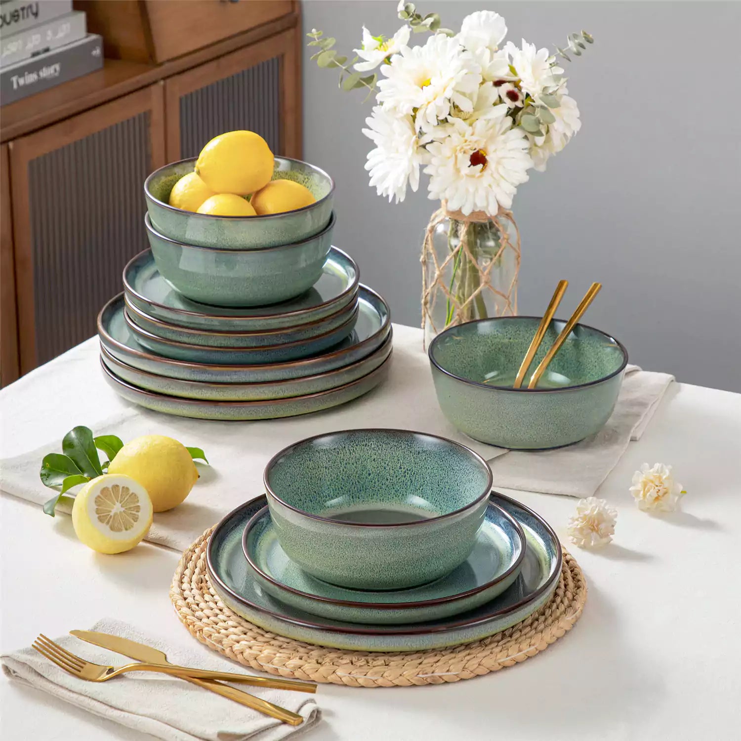 Sata green stoneware 12 piece dinnerware set with dinner plates salad plates and cereal bowls styled with gold cutlery on textured surface farmhouse reactive glaze lipped edge service for 4