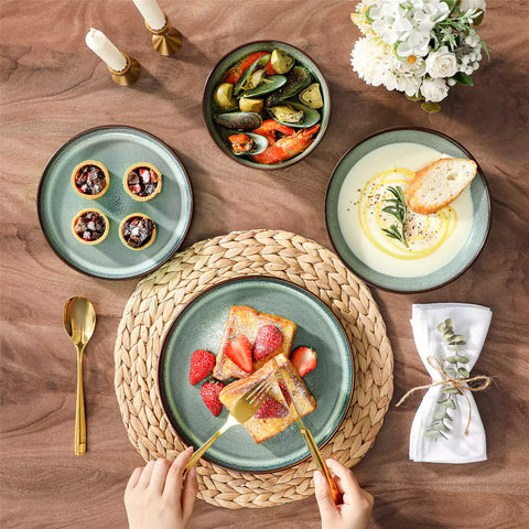 Sata green stoneware dinnerware set styled dining table with dinner plates salad plates pasta bowls cereal bowls silverware and floral centerpiece farmhouse reactive glaze service for 6