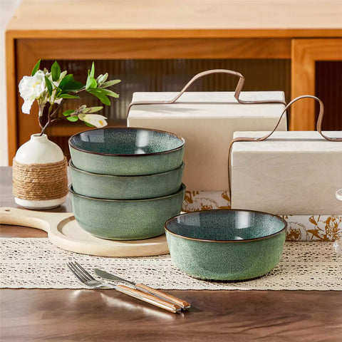 Sata green stoneware cereal bowls set of 4 with assorted meals styled on a wooden table with lace tablecloth farmhouse reactive glaze lipped edge artisan finish