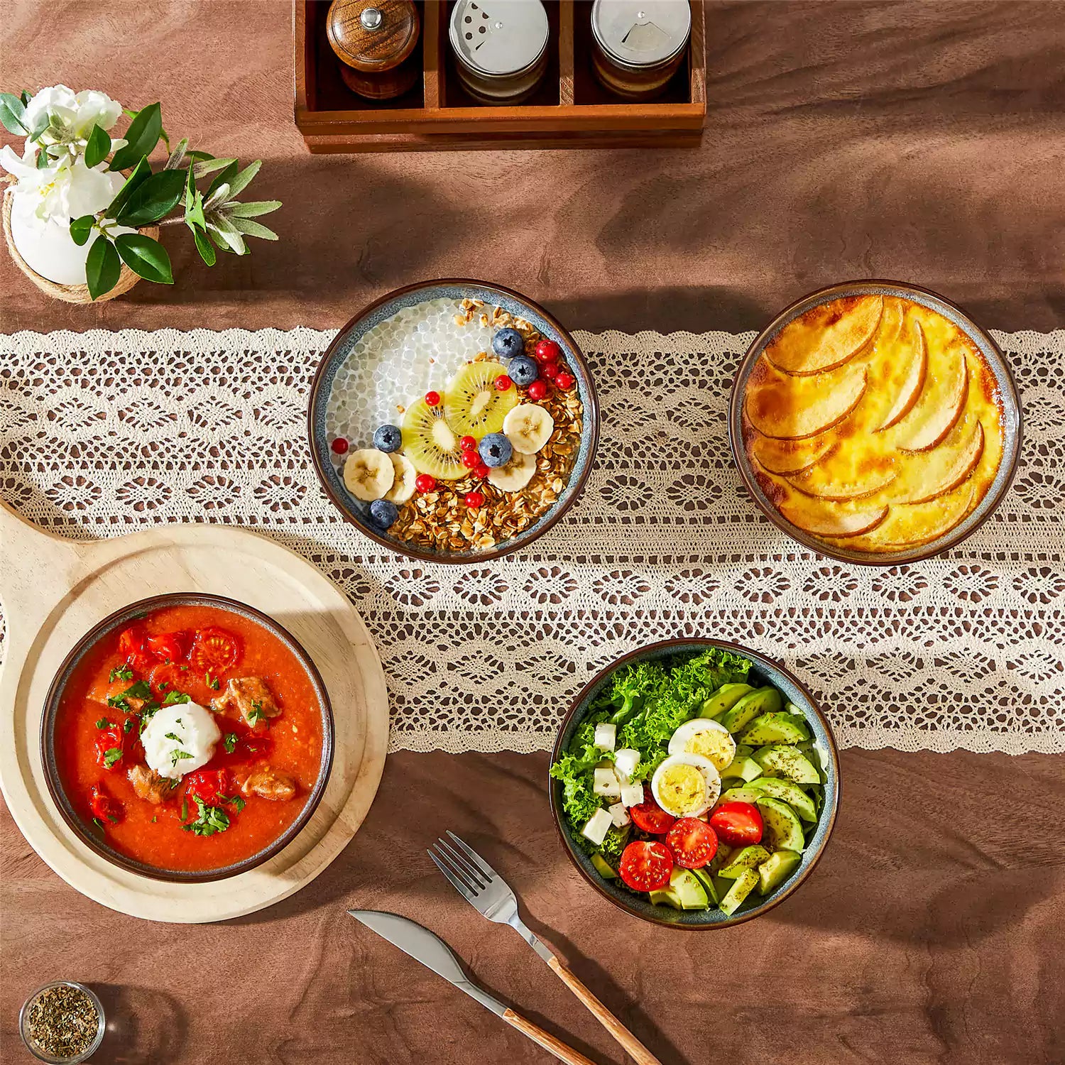 Sata green stoneware cereal bowls set of 4 with assorted meals styled on a wooden table with lace tablecloth farmhouse reactive glaze lipped edge artisan finish
