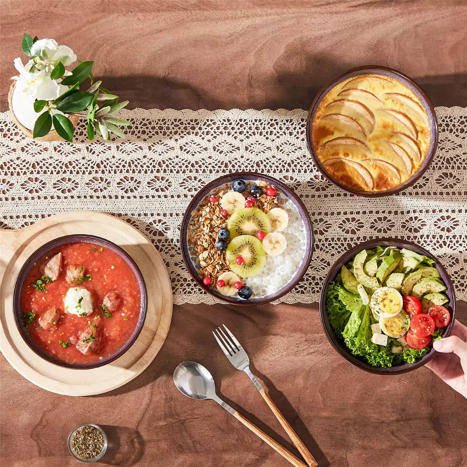Sata purple stoneware cereal bowls set of 4 with assorted meals styled on a wooden table with lace tablecloth farmhouse reactive glaze lipped edge artisan finish