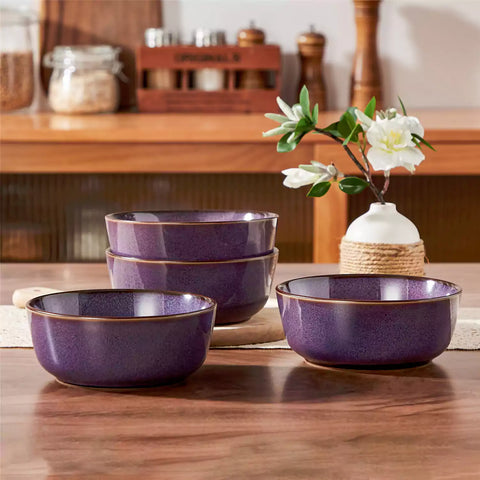 Sata purple stoneware cereal bowls set of 4 with assorted meals styled on a wooden table with lace tablecloth farmhouse reactive glaze lipped edge artisan finish