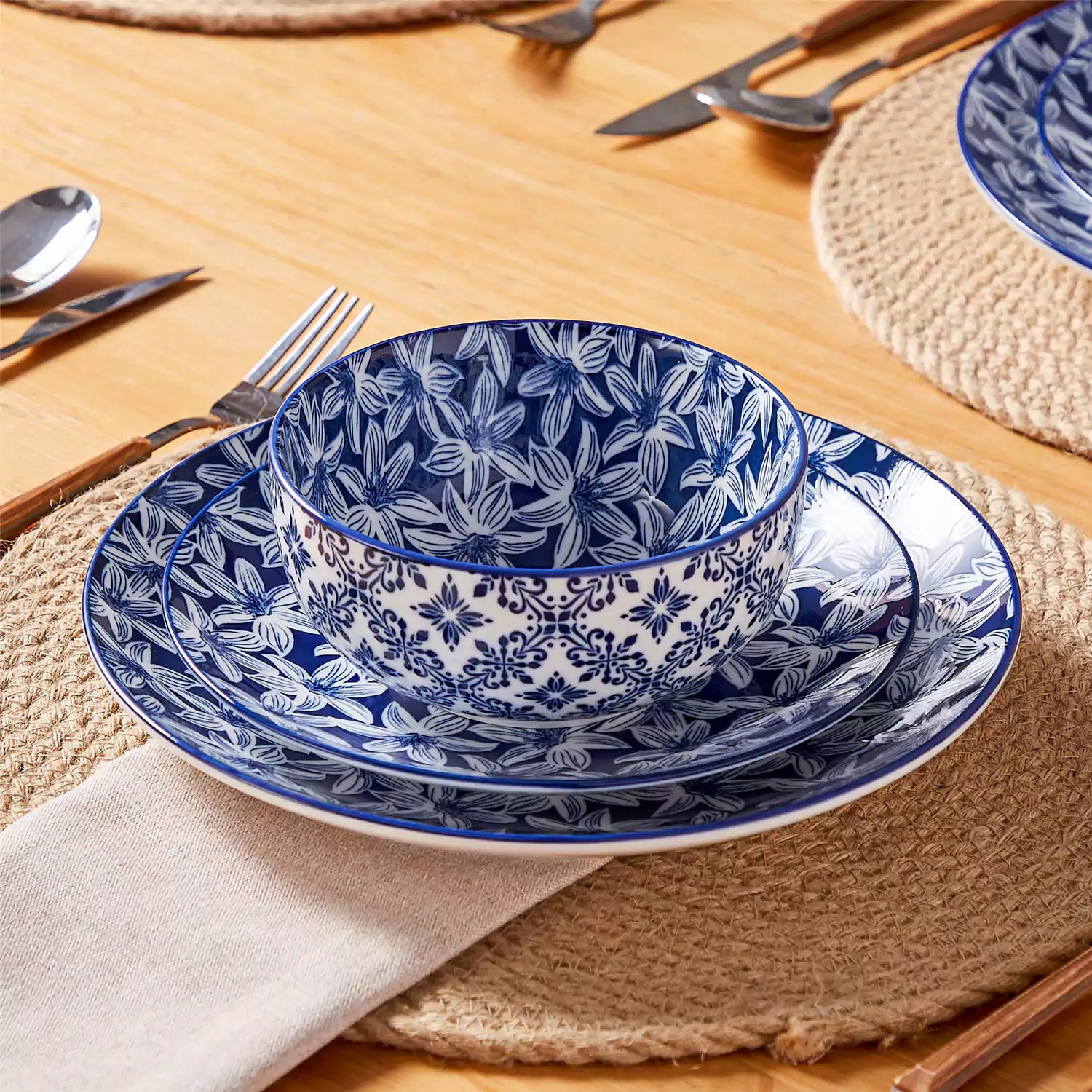 Selene 12-Piece Porcelain Dinnerware Set with blue and white Lily pattern and Japanese-inspired design - including matching plates and bowls-vancasso