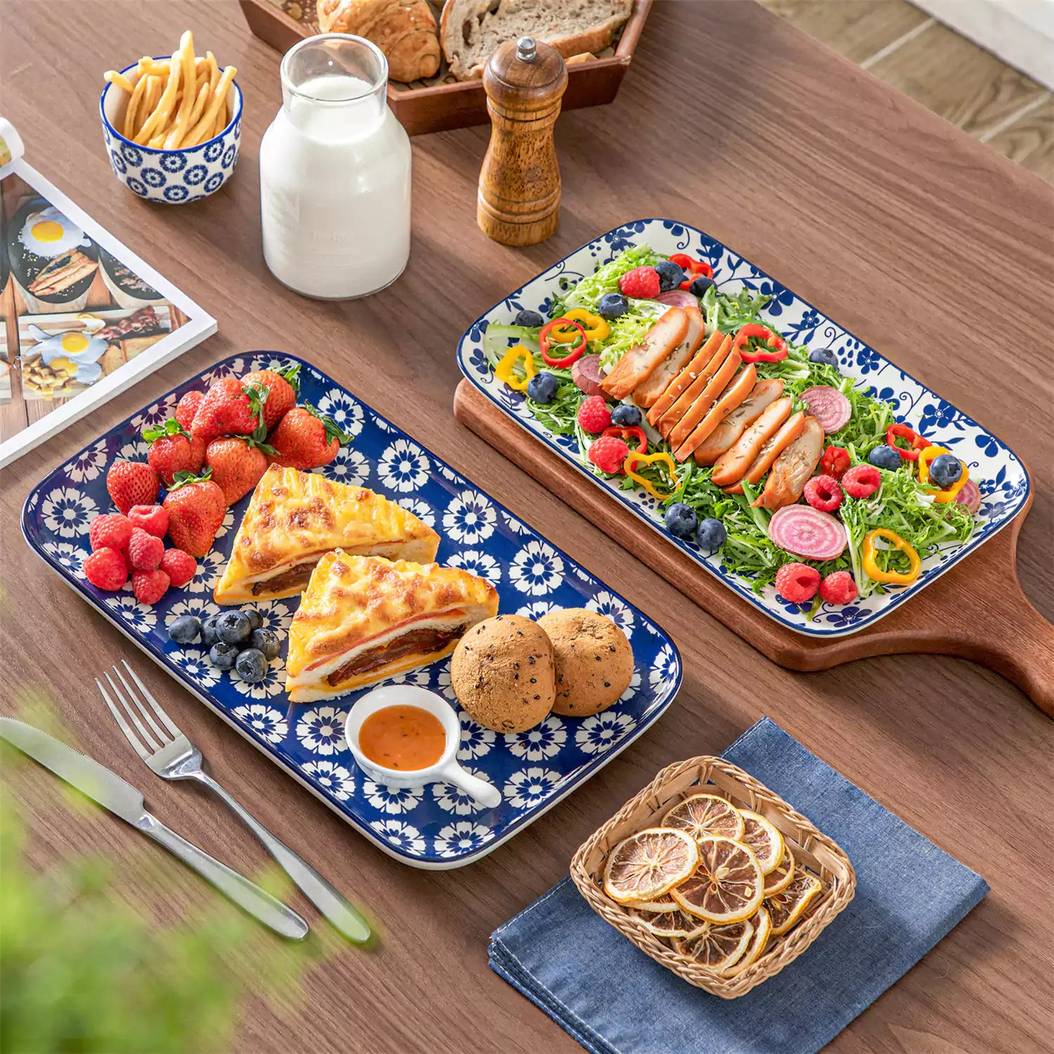 Selene serving platters Set B on dining table with assorted appetizers - fresh fruits - and pastries for elegant entertaining