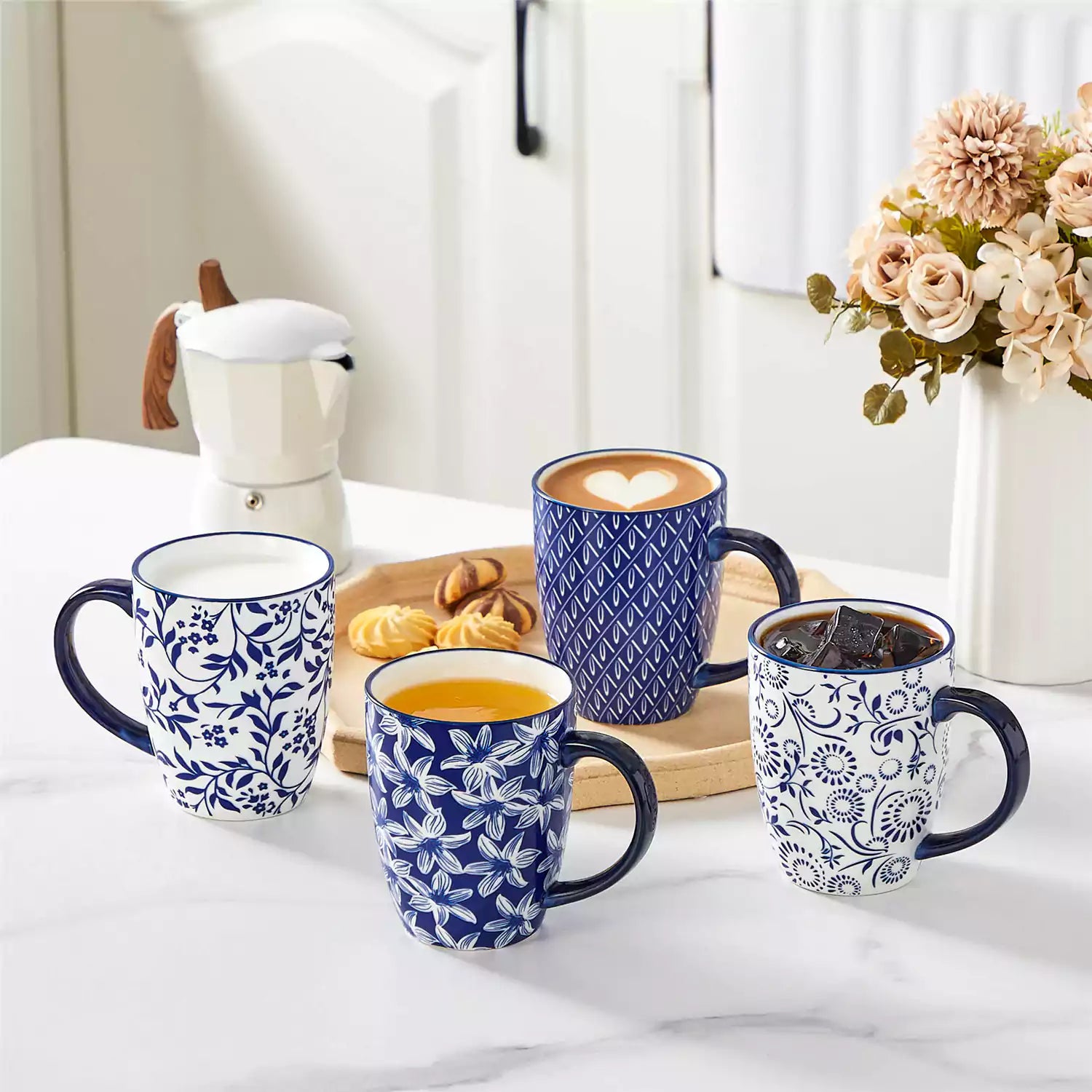 Mix and match Asian inspired porcelain mugs with Japanese indigo patterns on a coffee table