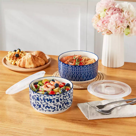 Selene deep blue and white floral porcelain food storage bowls set of 2 styled with fresh fruit and noodles on rustic wood table Japanese inspired ceramic kitchenware
