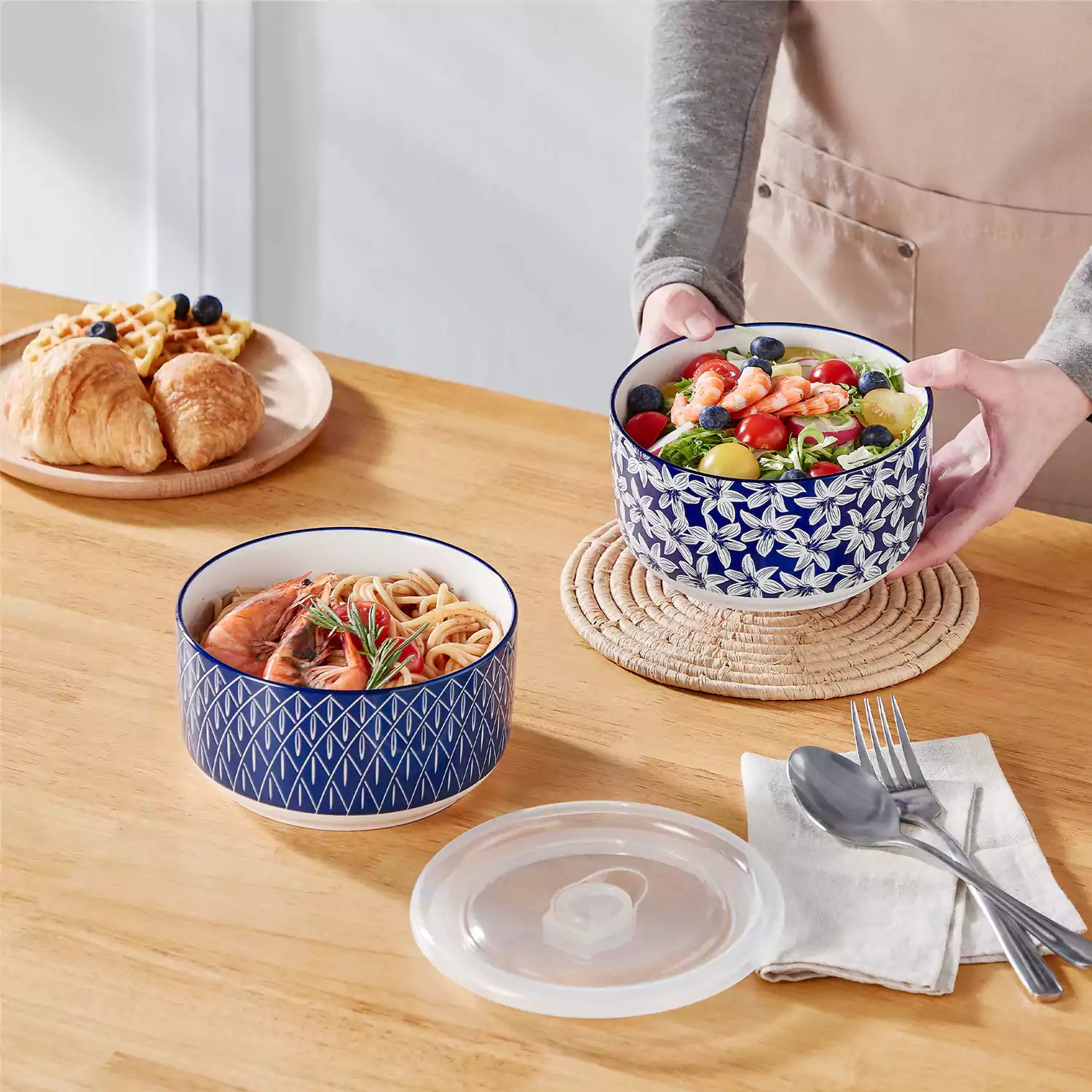Selene deep blue and white floral porcelain food storage bowls set of 2 styled with fresh fruit and noodles on rustic wood table Japanese inspired ceramic kitchenware