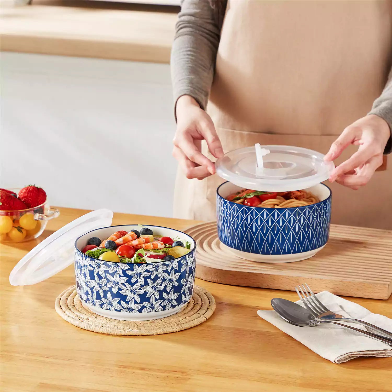 Selene deep blue and white floral porcelain food storage bowls set of 2 styled with fresh fruit and noodles on rustic wood table Japanese inspired ceramic kitchenware