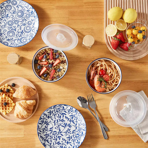 Selene deep blue and white floral porcelain food storage bowls set of 2 styled with fresh fruit and noodles on rustic wood table Japanese inspired ceramic kitchenware
