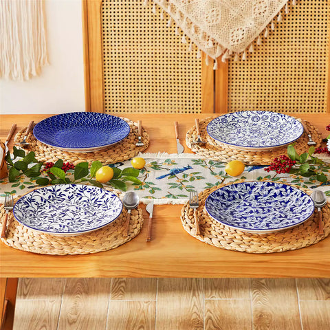 Selene porcelain dinner plates set of 4 styled with pizza and bread on woven placemat mix and match Japanese inspired table setting