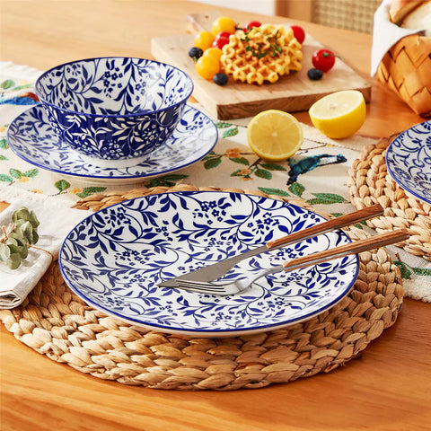 Selene porcelain dinner plates set of 4 styled with pizza and bread on woven placemat mix and match Japanese inspired table setting